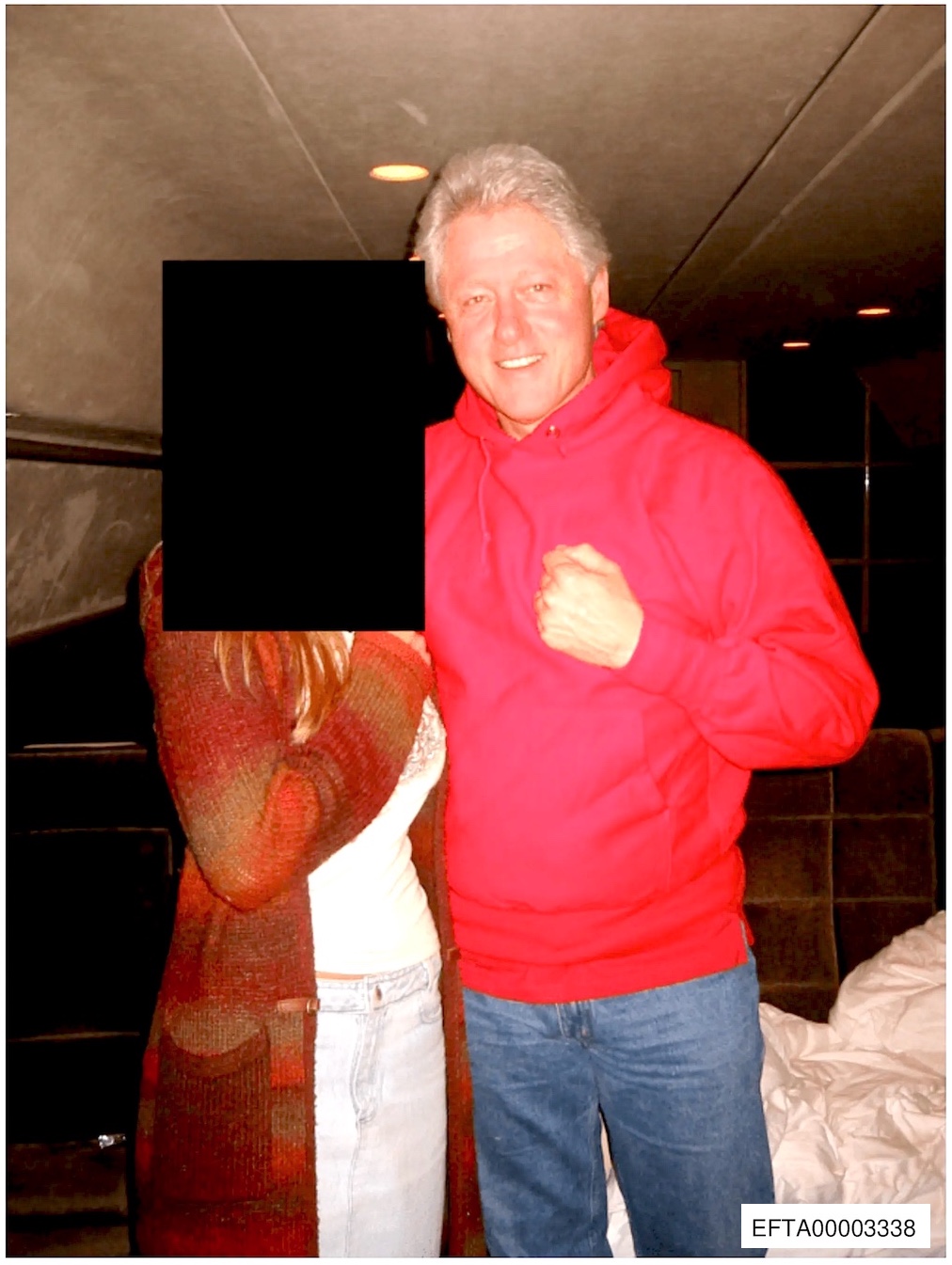 EFTA00003338-sm (Bill Clinton gives thumbs up with a comely young woman)