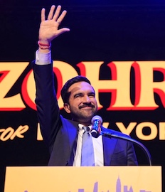 (Zohran Mamdani waves at supporters)